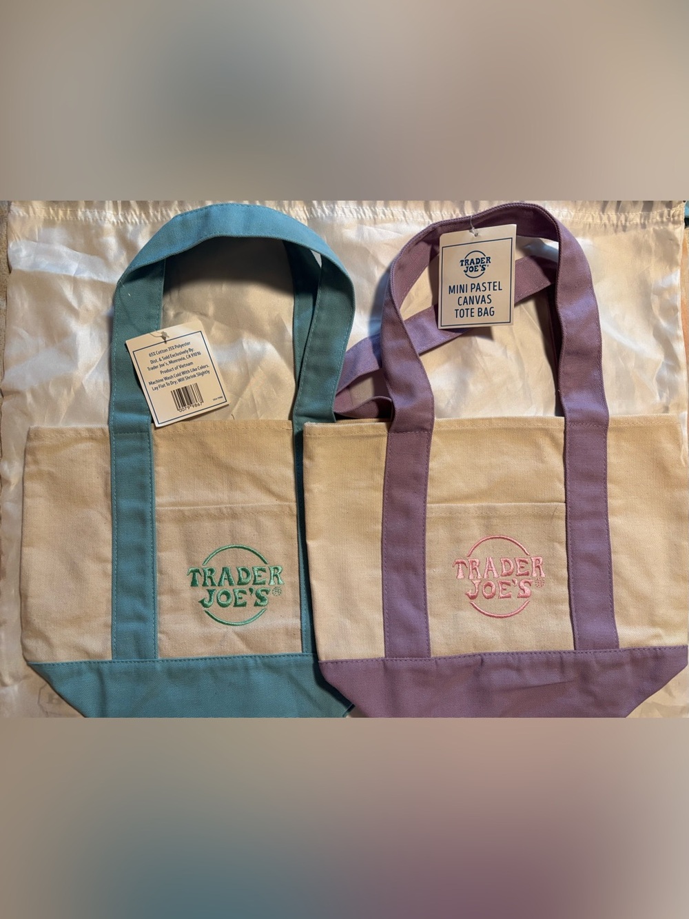 A set of Two Trader Joe's Mini Pastel Canvas Tote Bag - Blue and Purple
